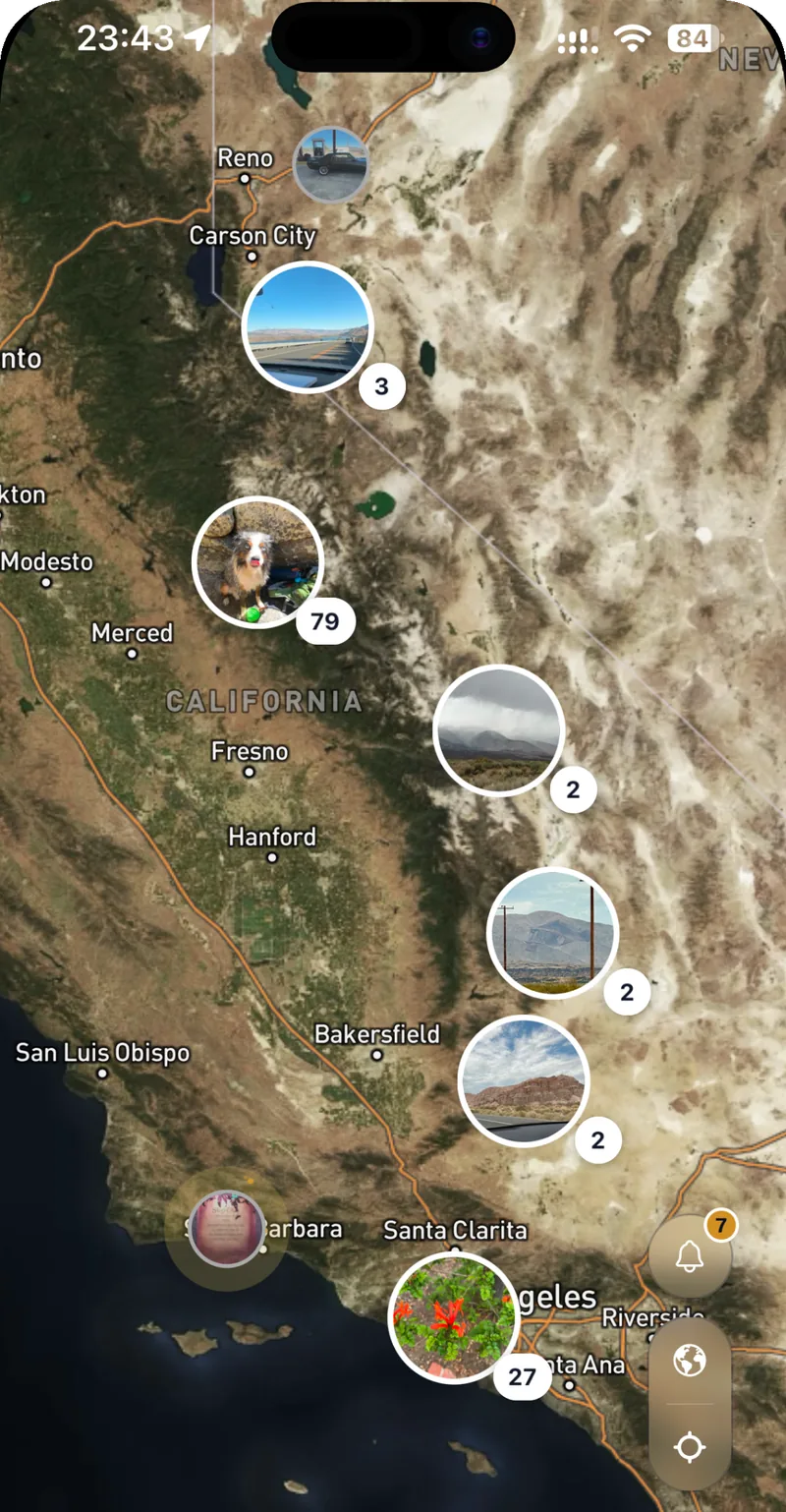 The map covered in photo pins, each one something a person left at that spot
