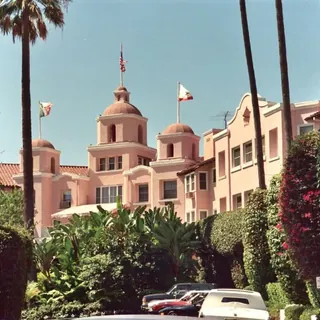 A grand pink hotel that a whole neighbourhood is known for